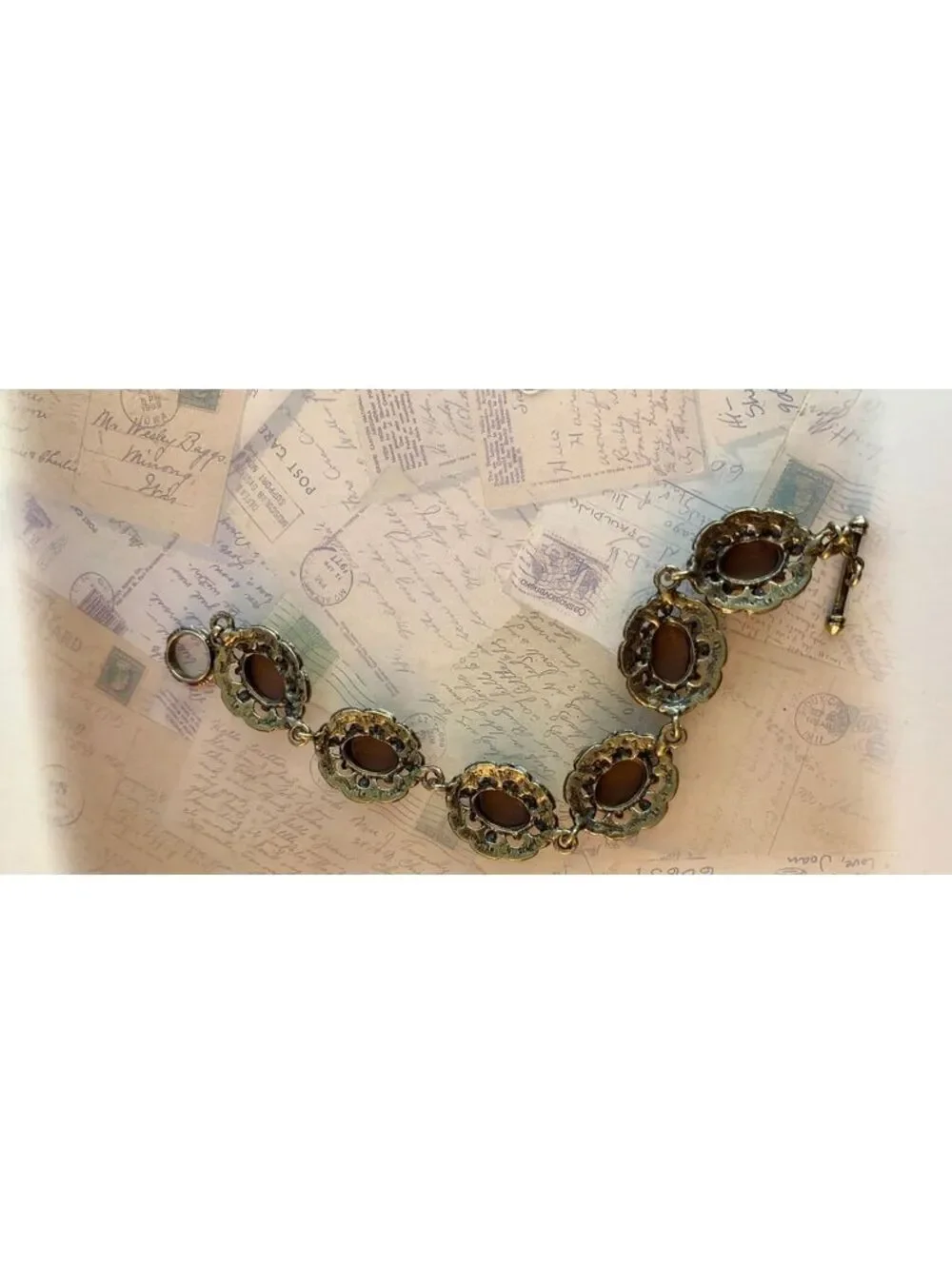 Charming Cameo Bracelet with Intricate Metalwork & Classic Elegance